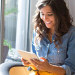 Happy women journaling